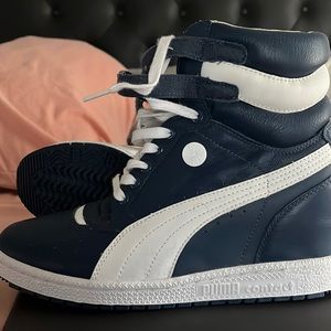 Never worn; blue and white puma shoes, size 9